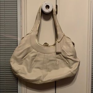 Authentic Coach cream and gold hobo bag with clasp